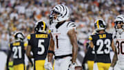 Oct 16, 2025; Cincinnati, Ohio, USA; Cincinnati Bengals wide receiver Ja'Marr Chase (1) acknowledges the crowd with running back Chase Brown (30) after scoring a touchdown against the Pittsburgh Steelers during the second quarter at Paycor Stadium. Mandatory Credit: Katie Stratman-Imagn Images
