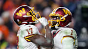 Nov 30, 2025; Landover, Maryland, USA; Washington Commanders wide receiver Terry McLaurin (17) celebrates after scoring a touchdown with Washington Commanders wide receiver Deebo Samuel (1) in overtime of the game at Northwest Stadium. Mandatory Credit: Peter Casey-Imagn Images