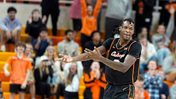 Oklahoma State's Marchelus Avery (0) celebrates a 3-point basket during the college basketball game between the Oklahoma State University Cowboys and the Southern Illinois Salukis, Thursday, Nov. 14, 2024.