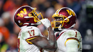 Nov 30, 2025; Landover, Maryland, USA; Washington Commanders wide receiver Terry McLaurin (17) celebrates after scoring a touchdown with Washington Commanders wide receiver Deebo Samuel (1) in overtime of the game at Northwest Stadium. Mandatory Credit: Peter Casey-Imagn Images