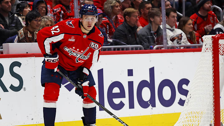 Jan 2, 2025; Washington, District of Columbia, USA; Washington Capitals defenseman Martin Fehervary (42) handles the puck against the Minnesota Wild at Capital One Arena. Mandatory Credit: Peter Casey-Imagn Images
