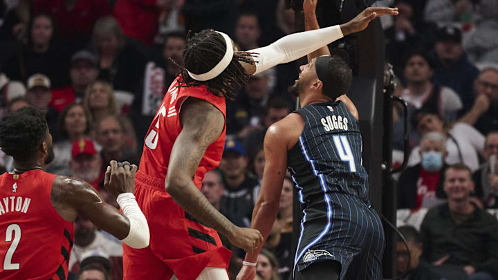 Oct 27, 2023; Portland, Oregon, USA; Orlando Magic guard Jalen Suggs (4) shoots the ball during the first half against Portland Trail Blazers center Robert Williams III (35) at Moda Center.