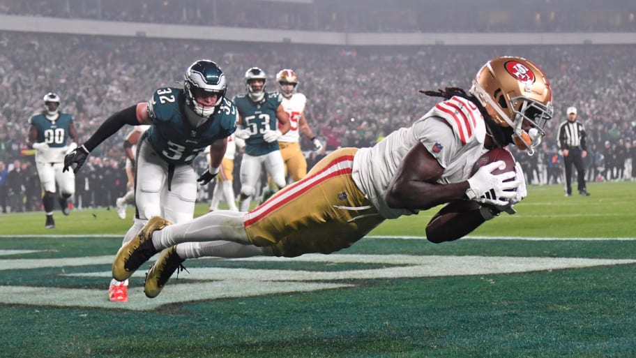 Dec 3, 2023; Philadelphia, Pennsylvania, USA; 49ers’ Brandon Aiyuk catches touchdown pass vs. Eagles.