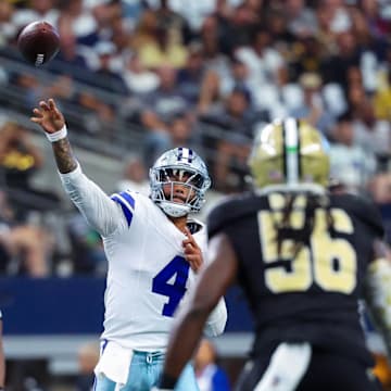 Dallas Cowboys quarterback Dak Prescott (4) throws during the first quarter against the New Orleans Saints at AT&T Stadium.