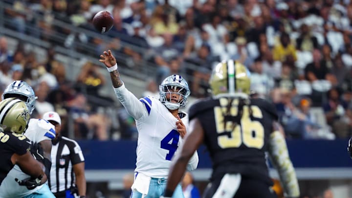 Dallas Cowboys quarterback Dak Prescott (4) throws during the first quarter against the New Orleans Saints at AT&T Stadium.