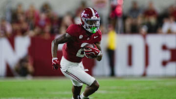 Sep 7, 2024; Tuscaloosa, Alabama, USA; Alabama Crimson Tide wide receiver Ryan Williams (2) runs the ball against the South Florida Bulls during the third quarter at Bryant-Denny Stadium. Mandatory Credit: William McLelland-Imagn Images
