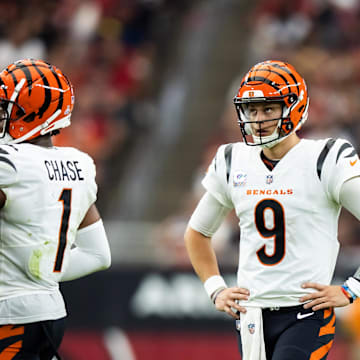 Oct 8, 2023; Glendale, Arizona, USA; Cincinnati Bengals quarterback Joe Burrow (9) and wide receiver Ja'Marr Chase (1) against the Arizona Cardinals in the second half at State Farm Stadium. Mandatory Credit: Mark J. Rebilas-Imagn Images