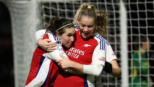 Arsenal teammates Mariona Caldentey and Alessia Russo celebrate.