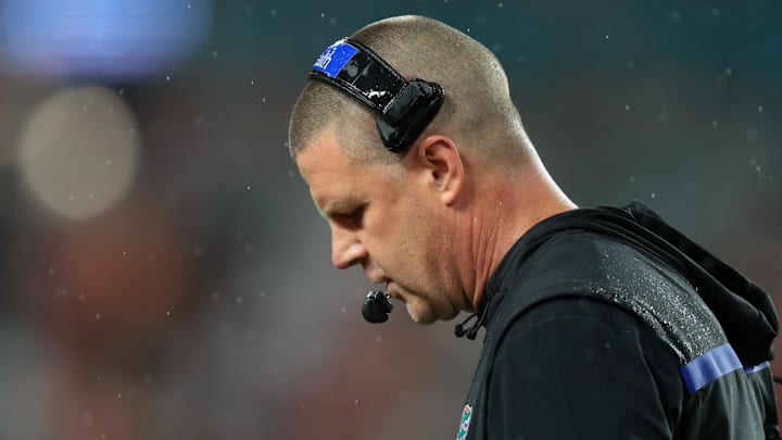 Sep 20, 2025; Miami Gardens, Florida, USA; Florida Gators head coach Billy Napier looks down against the Florida Gators during the first quarter at Hard Rock Stadium. Mandatory Credit: Sam Navarro-Imagn Images