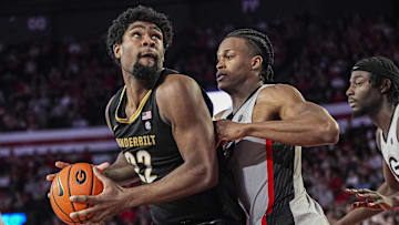 Vanderbilt Commodores forward Jaylen Carey (22) looks to shoot defended by Georgia Bulldogs forward RJ Godfrey (10) during the second half at Stegeman Coliseum.