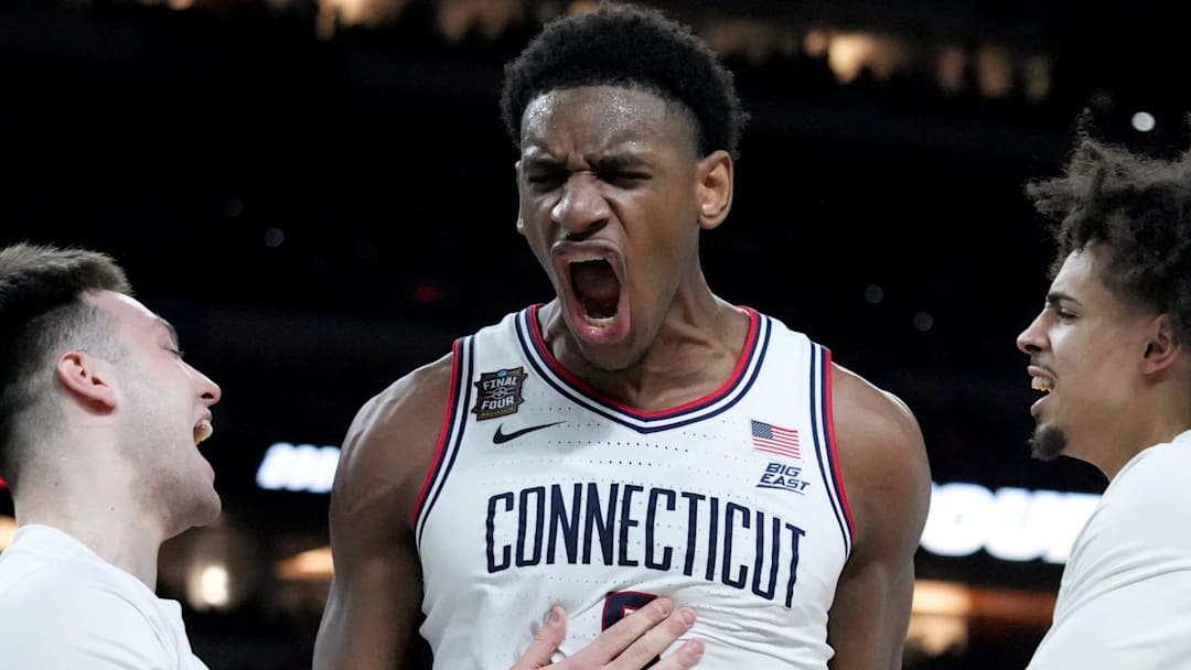 UConn Huskies forward Tarris Reed Jr. (5) celebrates the team’s Final Four victory Saturday, April 4, 2026, after defeating the Illinois Fighting Illini 71-62 at Lucas Oil Stadium in Indianapolis.