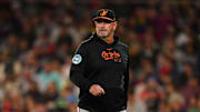 Sep 9, 2024; Boston, Massachusetts, USA; Baltimore Orioles manager Brandon Hyde (18) heads back to the dugout after replacing pitchers against the Boston Red Sox in the sixth inning at Fenway Park. Mandatory Credit: David Butler II-Imagn Images