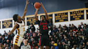 Stepinac's Jasiah Jervis (25) puts up a shot in front of Cardinal Hayes' Trevon Lewis (21) during the CHSAA Class AA basketball championship at Mount Saint Michael Academy in the Bronx Feb. 25, 2023. Cardinal Hayes won the game 85-69.

Stepinac Vs Hayes Chsaa Basketball Championship
