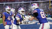 Buffalo Bills wide receiver Stefon Diggs (14) celebrates Buffalo Bills tight end Dalton Kincaid   s (86) touchdown.