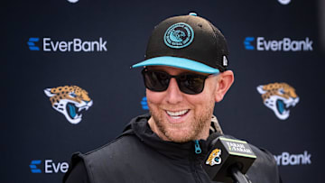 Jacksonville Jaguars head coach Liam Coen has a laugh while answering questions during a press conference after the seventh organized team activity at the Miller Electric Center in Jacksonville, Fla. Monday, June 2, 2025. [Doug Engle/Florida Times-Union]