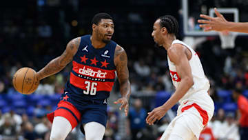 Mar 24, 2025; Washington, District of Columbia, USA; Washington Wizards guard Marcus Smart (36) handles the ball during the second quarter against the Toronto Raptors at Capital One Arena. Mandatory Credit: Reggie Hildred-Imagn Images