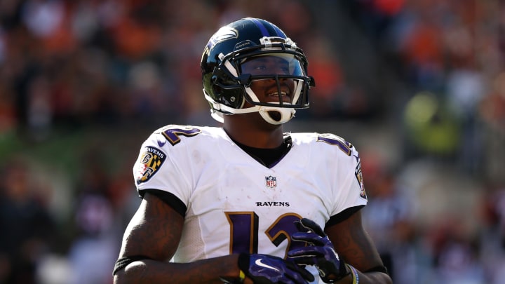 Oct 26, 2014; Cincinnati, OH, USA; Baltimore Ravens wide receiver Jacoby Jones (12) against the Cincinnati Bengals at Paul Brown Stadium. The Bengals won 27-24. Mandatory Credit: Aaron Doster-USA TODAY Sports