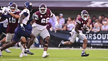 Sep 14, 2024; Starkville, Mississippi, USA; Mississippi State Bulldogs wide receiver Kevin Coleman Jr. (3) runs the ball against the Toledo Rockets during the first quarter at Davis Wade Stadium at Scott Field. Mandatory Credit: Matt Bush-Imagn Images