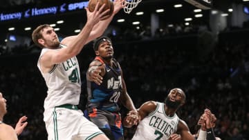 Nov 4, 2023; Brooklyn, New York, USA;  Boston Celtics center Luke Kornet (40) garbs a rebound in