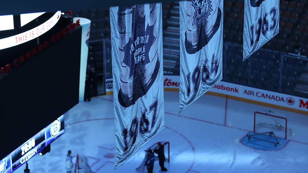 The Stanley Cup winning banners loom over the ice