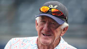Milwaukee Brewers radio broadcaster Bob Uecker looks on as the Brewers take batting practice before a game on June 19, 2018.