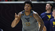 Mar 4, 2025; West Virginia forward Amani Hansberry (13) reacts to a shot against Utah during the second half.