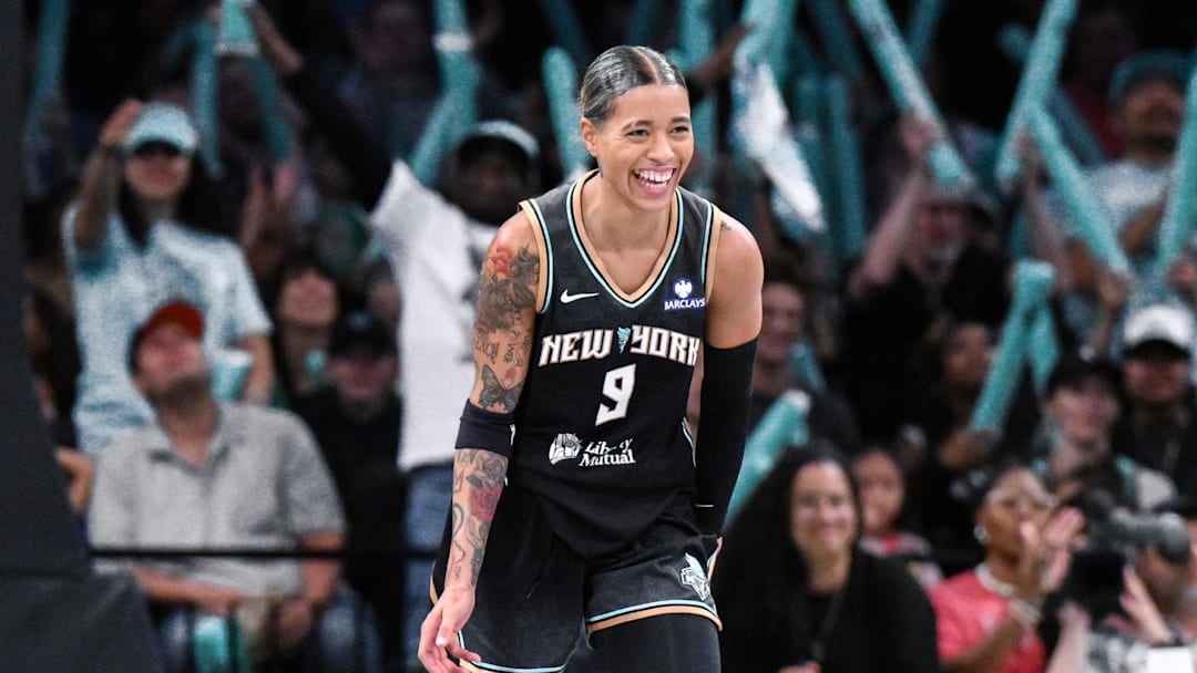 Jun 1, 2025; Brooklyn, New York, USA; New York Liberty guard Natasha Cloud (9) reacts during the second half against the Connecticut Sun at Barclays Center. Mandatory Credit: John Jones-Imagn Images