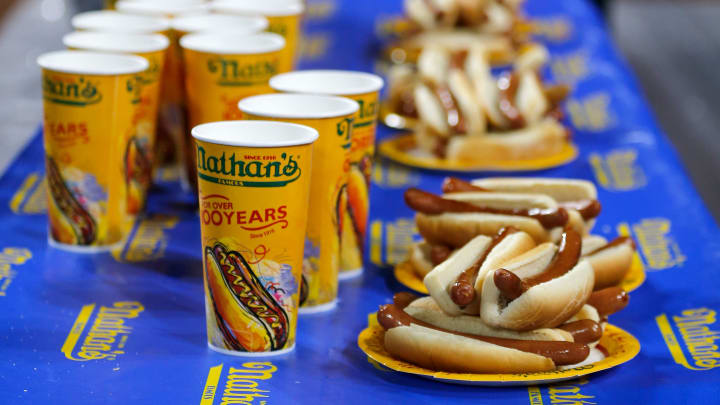 Hotdogs and water are laid out for the Nathan's Hot Dog Eating ContestLos Angeles Dodgers At Cincinnati Reds