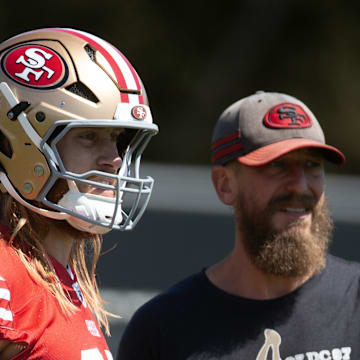 Jun 10, 2025; Santa Clara, CA, USA; San Francisco 49ers tight end George Kittle (85) works out with his teammates during an OTA at Levi's Stadium. Mandatory Credit: D. Ross Cameron-Imagn Images