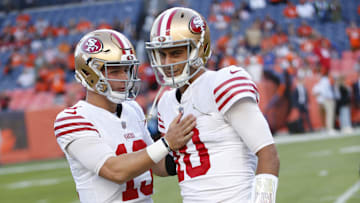 San Francisco 49ers quarterbacks Brock Purdy (L) and Jimmy Garoppolo (R)