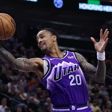 Mar 25, 2024; Salt Lake City, Utah, USA; Utah Jazz forward John Collins (20) rebounds against the Dallas Mavericks during the second quarter at Delta Center. Mandatory Credit: Rob Gray-Imagn Images