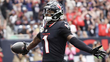 Sep 29, 2024; Houston, Texas, USA; Houston Texans wide receiver Stefon Diggs (1) scores against the Jacksonville Jaguars in the first quarter at NRG Stadium. Mandatory Credit: Thomas Shea-Imagn Images