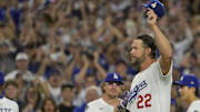 Los Angeles Dodgers starting pitcher Clayton Kershaw (22) tips his cap while walking off the field after throwing the 3000th strikeout pitch to end the sixth inning against the Chicago White Sox at Dodger Stadium on July 2.