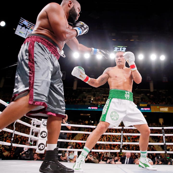Oleksandr Usyk and Chazz Witherspoon box during a heavyweight boxing match at Wintrust Arena. 