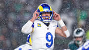 Jan 19, 2025; Philadelphia, Pennsylvania, USA; Los Angeles Rams quarterback Matthew Stafford (9) calls a play at the one of scrimmage against the Philadelphia Eagles in a 2025 NFC divisional round game at Lincoln Financial Field. Mandatory Credit: Bill Streicher-Imagn Images