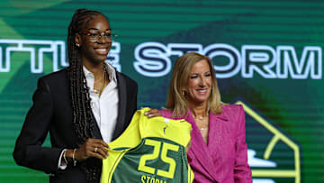 Dominique Malonga of France,  with WNBA commissioner Cathy Engelbert,  is part of a trend towards more non-NCAA international players being selected at the top of the draft. 