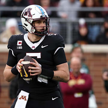 Nov 1, 2025; Minneapolis, Minnesota, USA; Minnesota Golden Gophers quarterback Drake Lindsey (5) looks to throw against the Michigan State Spartans during the second half at Huntington Bank Stadium. Mandatory Credit: Matt Krohn-Imagn Images