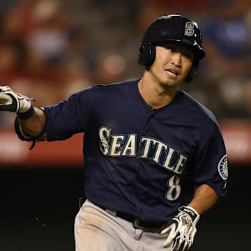 Seattle Mariners left fielder Nori Aoki (8) throws his bat after grounding out against the Los Angeles Angels during the ninth inning at Angel Stadium of Anaheim. The Seattle Mariners won 3-2 in 2016.