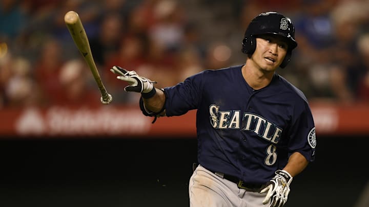 Seattle Mariners left fielder Nori Aoki (8) throws his bat after grounding out against the Los Angeles Angels during the ninth inning at Angel Stadium of Anaheim. The Seattle Mariners won 3-2 in 2016.