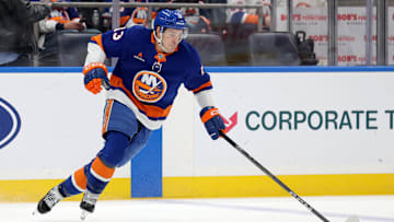 Jan 25, 2025; Elmont, New York, USA; New York Islanders center Mathew Barzal (13) plays the puck against the Carolina Hurricanes during the third period at UBS Arena. Mandatory Credit: Brad Penner-Imagn Images