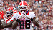 Georgia Bulldogs wide receiver Zachariah Branch (1) and wide receiver Dillon Bell (86) react after a touchdown against the Mississippi State Bulldogs during the first half at Davis Wade Stadium at Scott Field.