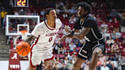 Alabama guard Labaron Philon drives against Mississippi State forward Cameron Matthews during a recent game.