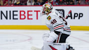 Apr 15, 2025; Ottawa, Ontario, CAN; Chicago Blackhawks goalie Spencer Knight (30)  warms up prior to the start of game against the  Ottawa Senators at the Canadian Tire Centre. Mandatory Credit: Marc DesRosiers-Imagn Images