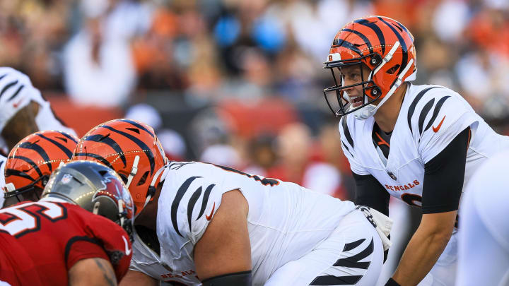 Aug 10, 2024; Cincinnati, Ohio, USA; Cincinnati Bengals quarterback Joe Burrow (9) snaps the ball against the Tampa Bay Buccaneers in the first half at Paycor Stadium. Mandatory Credit: Katie Stratman-USA TODAY Sports