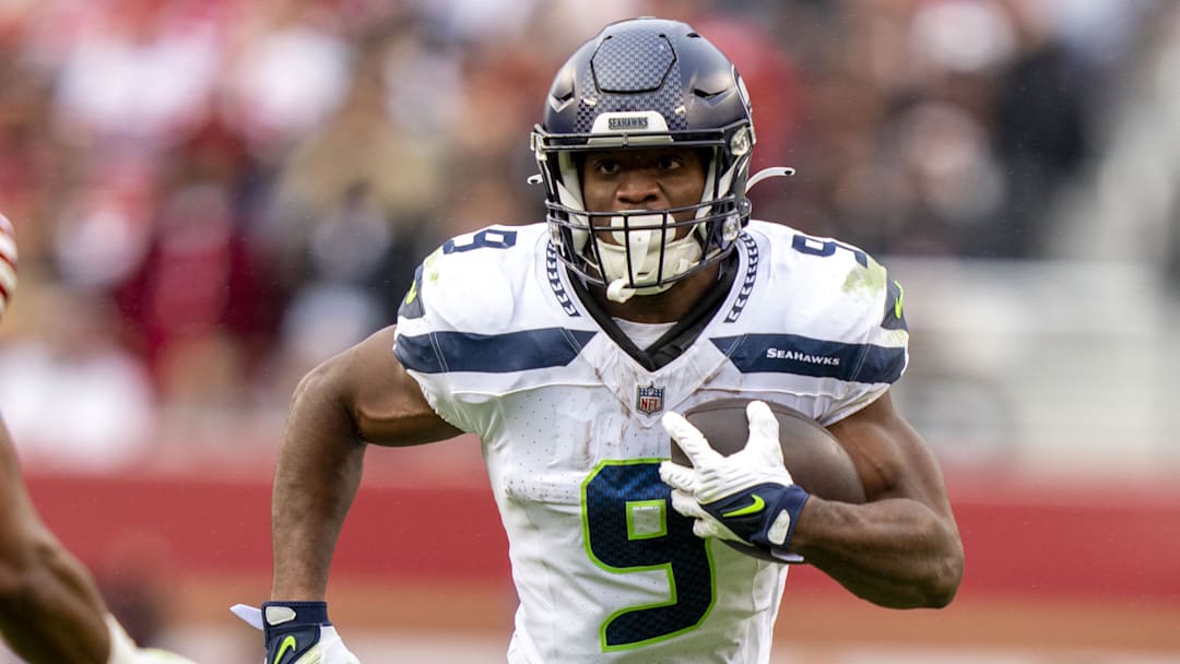 November 17, 2024; Santa Clara, California, USA; Seattle Seahawks running back Kenneth Walker III (9) runs the football against the San Francisco 49ers during the third quarter at Levi's Stadium. Mandatory Credit: Kyle Terada-Imagn Images
