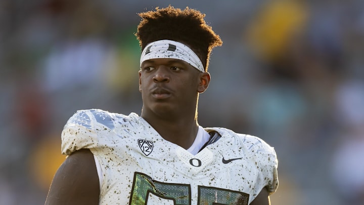 Nov 18, 2023; Tempe, Arizona, USA; Oregon Ducks offensive lineman Marcus Harper II (55) against the Arizona State Sun Devils at Mountain America Stadium. Mandatory Credit: Mark J. Rebilas-Imagn Images Nov 18, 2023; Tempe, Arizona, USA; Oregon Ducks offensive lineman Marcus Harper II (55) against the Arizona State Sun Devils at Mountain America Stadium. Mandatory Credit: Mark J. Rebilas-Imagn Images