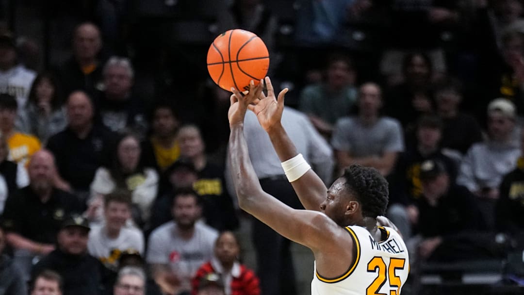 Feb 18, 2026; Columbia, Missouri, USA; Missouri Tigers forward Mark Mitchell (25) makes a three point shot against the Vanderbilt Commodores during the second half of the game at Mizzou Arena. Mandatory Credit: Denny Medley-Imagn Images
