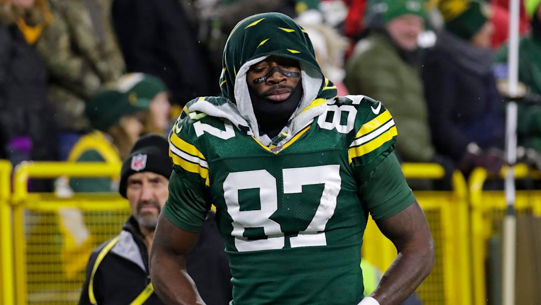 Green Bay Packers wide receiver Romeo Doubs (87) leaves the field after getting injured on a pass interference play commited by San Francisco 49ers cornerback Renardo Green (0) in the third quarter during their football game Sunday, November 24, 2024, at Lambeau Field in Green Bay, Wisconsin.