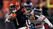 Cincinnati Bengals wide receiver Ja'Marr Chase (1) breaks away with a reception in the fourth quarter of the NFL Week 17 game between the Cincinnati Bengals and the Denver Broncos at Paycor Stadium in downtown Cincinnati on Saturday, Dec. 28, 2024. The Bengals took a 30-24 win in overtime to remain in the post season chase.
