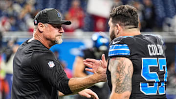 Detroit Lions head coach Dan Campbell shakes hands with center Trystan Colon (57) at warm up against Tampa Bay Buccaneers at Ford Field in Detroit on Monday, Oct. 20, 2025.
